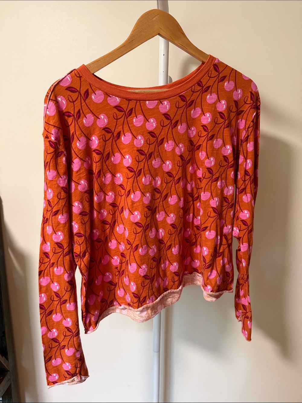 Anthropologie Orange Long-Sleeve Top with Pink Cherry Print